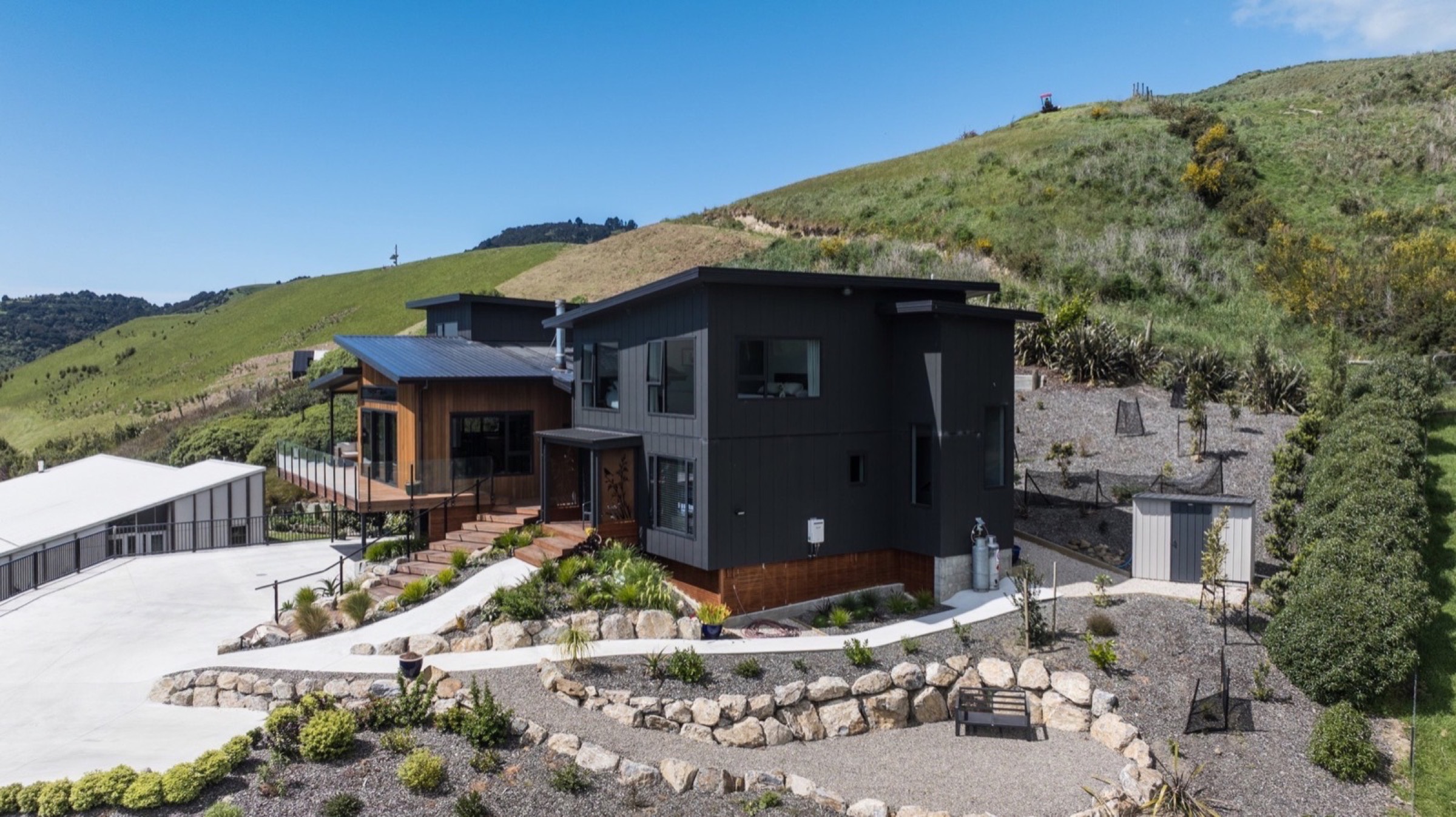 A black-clad Aspect Builders home on a Nelson hillside
